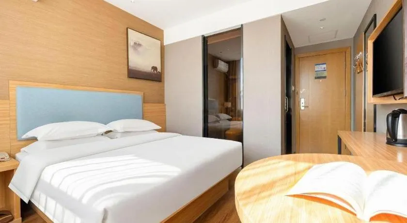 Bed in JTOUR Inn Guigang Life Port High-speed Railway Station