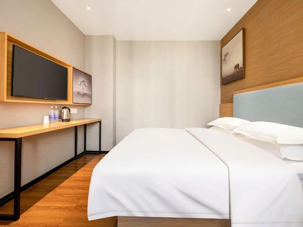 Bed in JTOUR Inn Guigang Life Port High-speed Railway Station