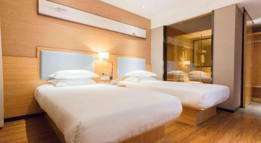 Bed in JTOUR Inn Guigang Life Port High-speed Railway Station