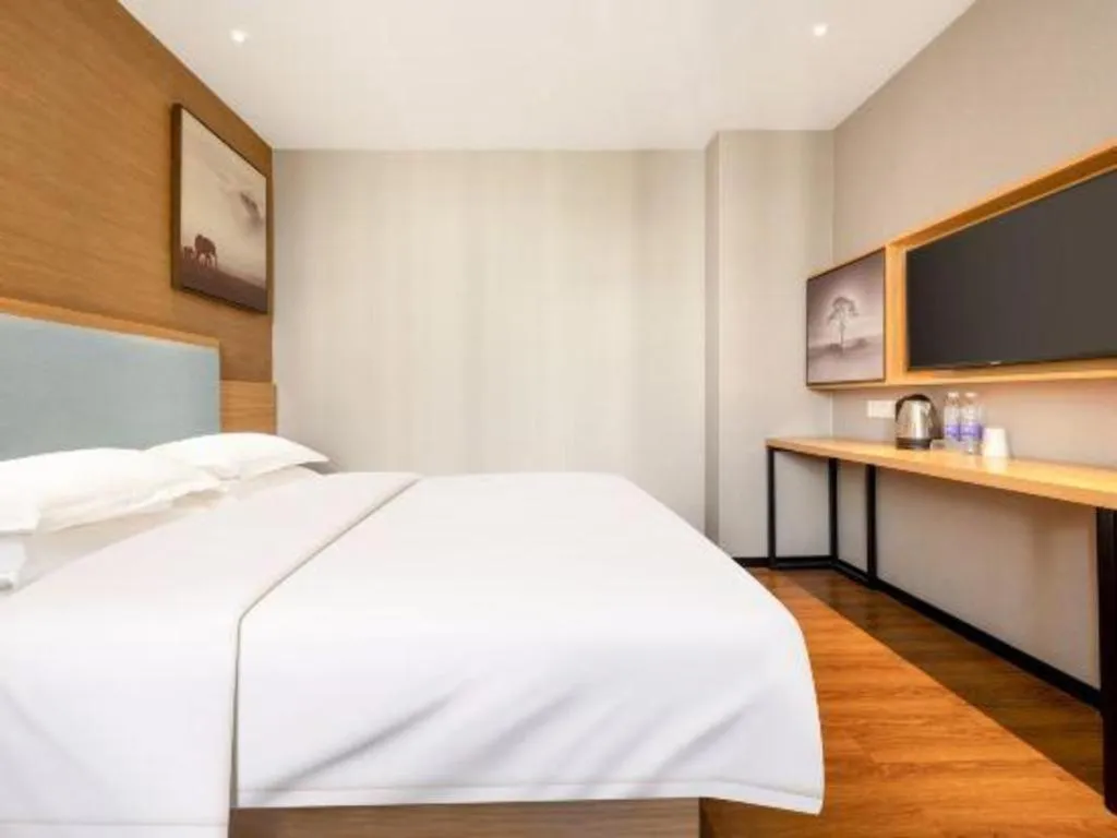 Bed in JTOUR Inn Guigang Life Port High-speed Railway Station