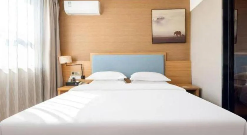 Bed in JTOUR Inn Guigang Life Port High-speed Railway Station