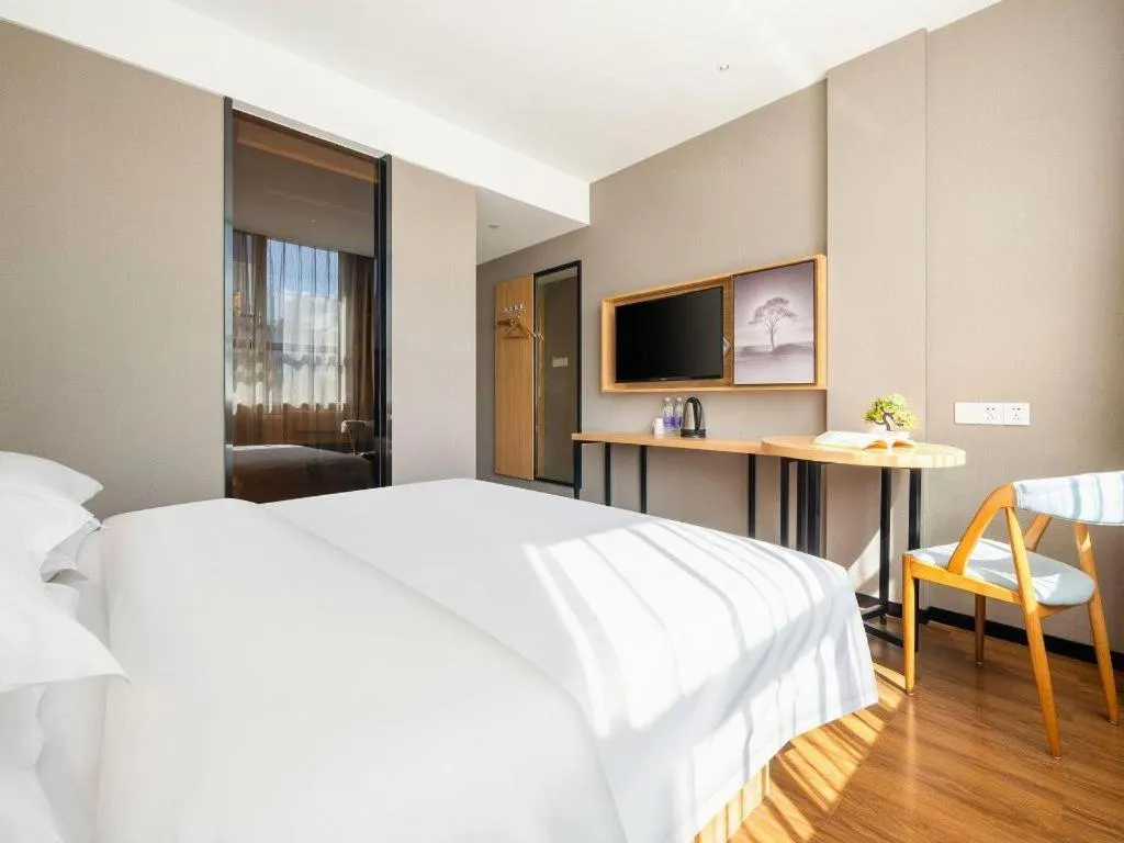 Bed in JTOUR Inn Guigang Life Port High-speed Railway Station