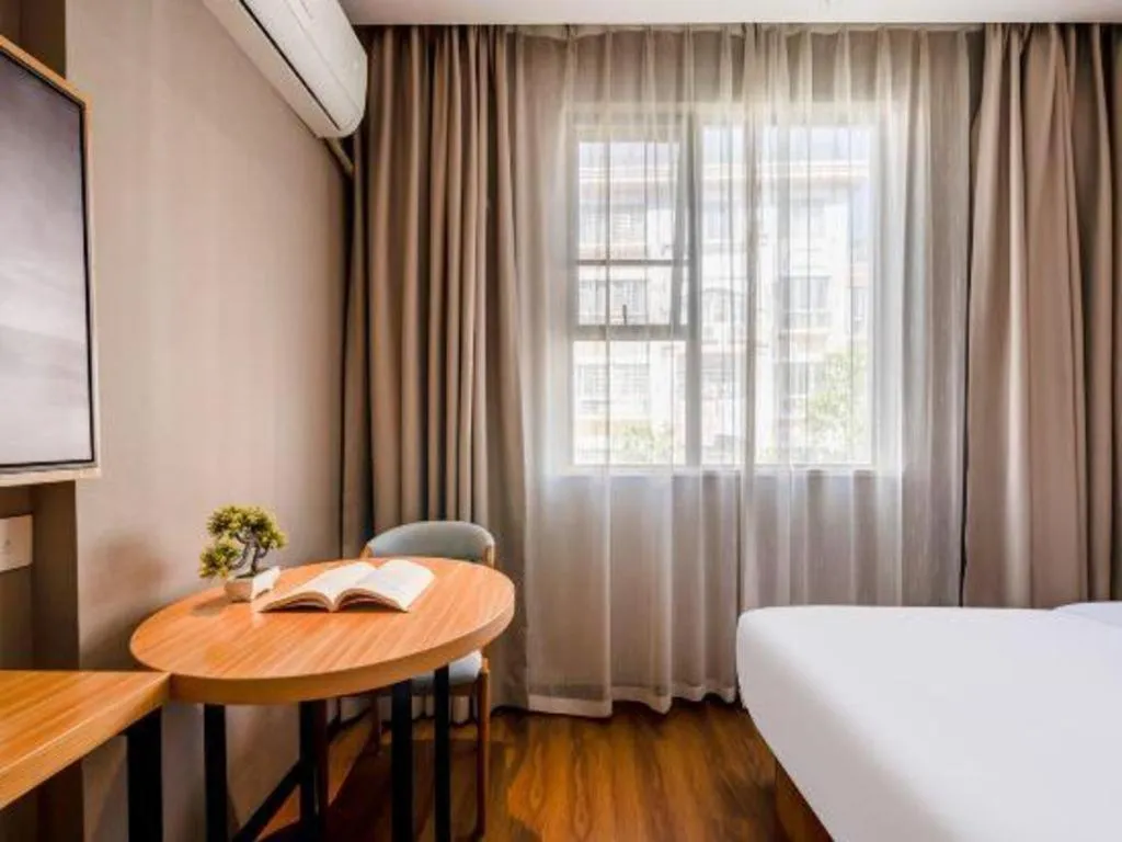 Bed in JTOUR Inn Guigang Life Port High-speed Railway Station