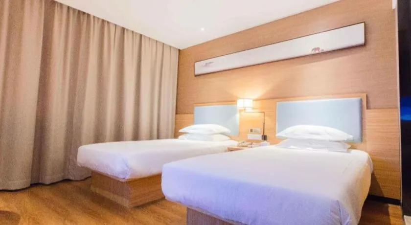 Bed in JTOUR Inn Guigang Life Port High-speed Railway Station