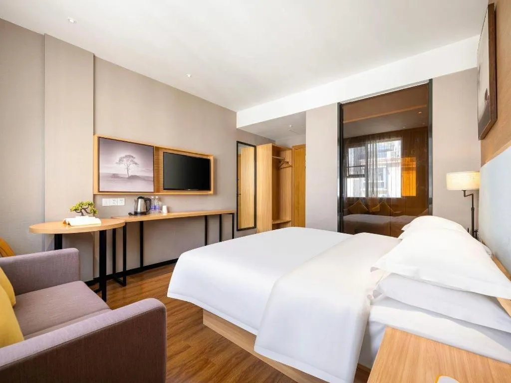 Bed in JTOUR Inn Guigang Life Port High-speed Railway Station