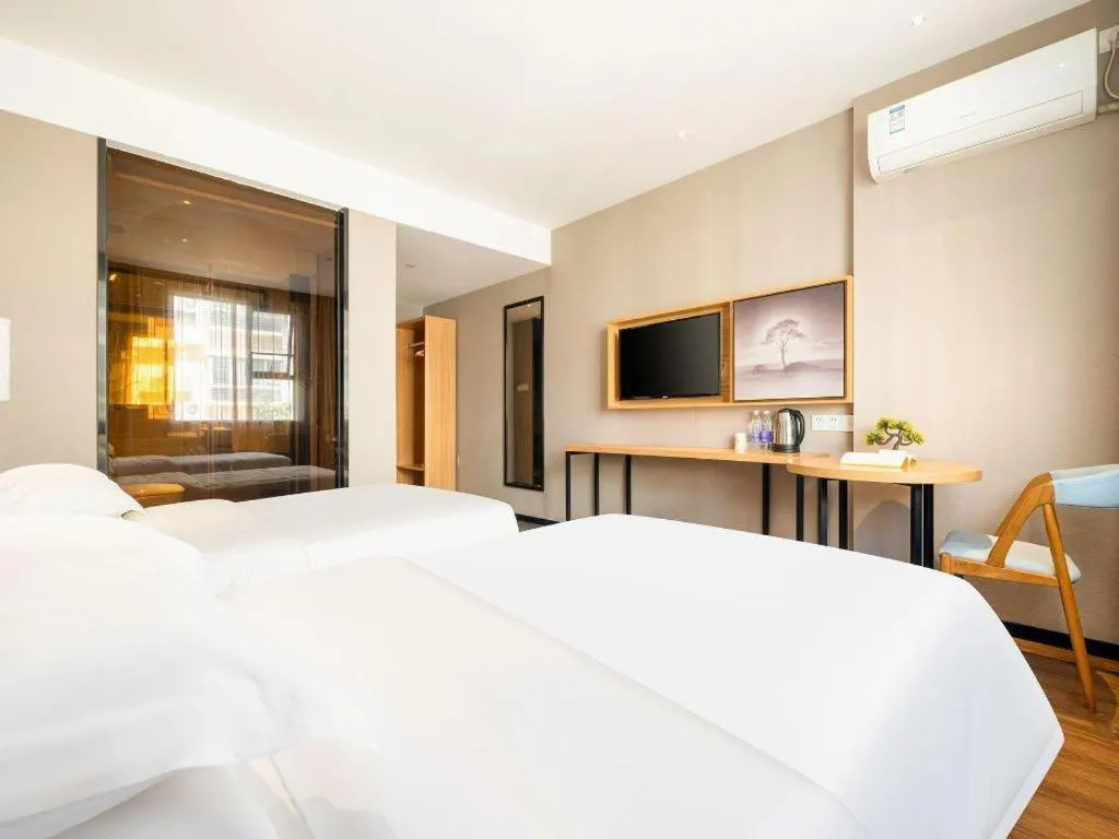 Bed in JTOUR Inn Guigang Life Port High-speed Railway Station
