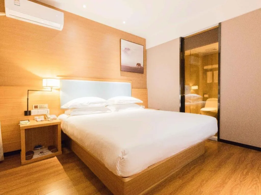 Bed in JTOUR Inn Guigang Life Port High-speed Railway Station