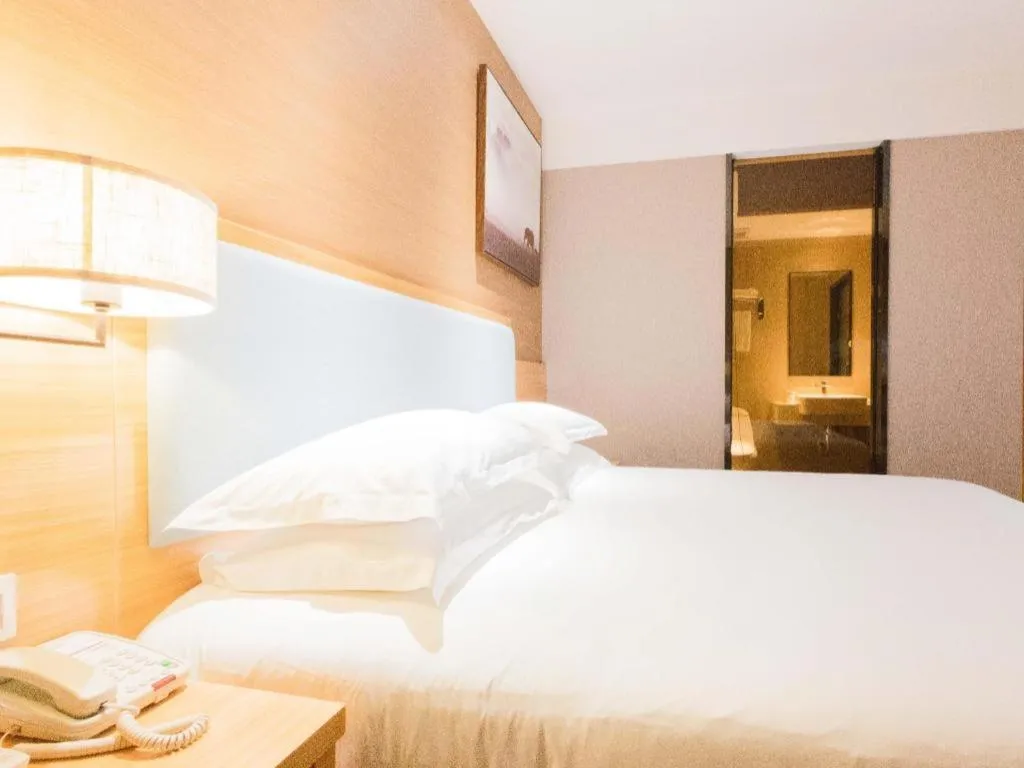 Bed in JTOUR Inn Guigang Life Port High-speed Railway Station