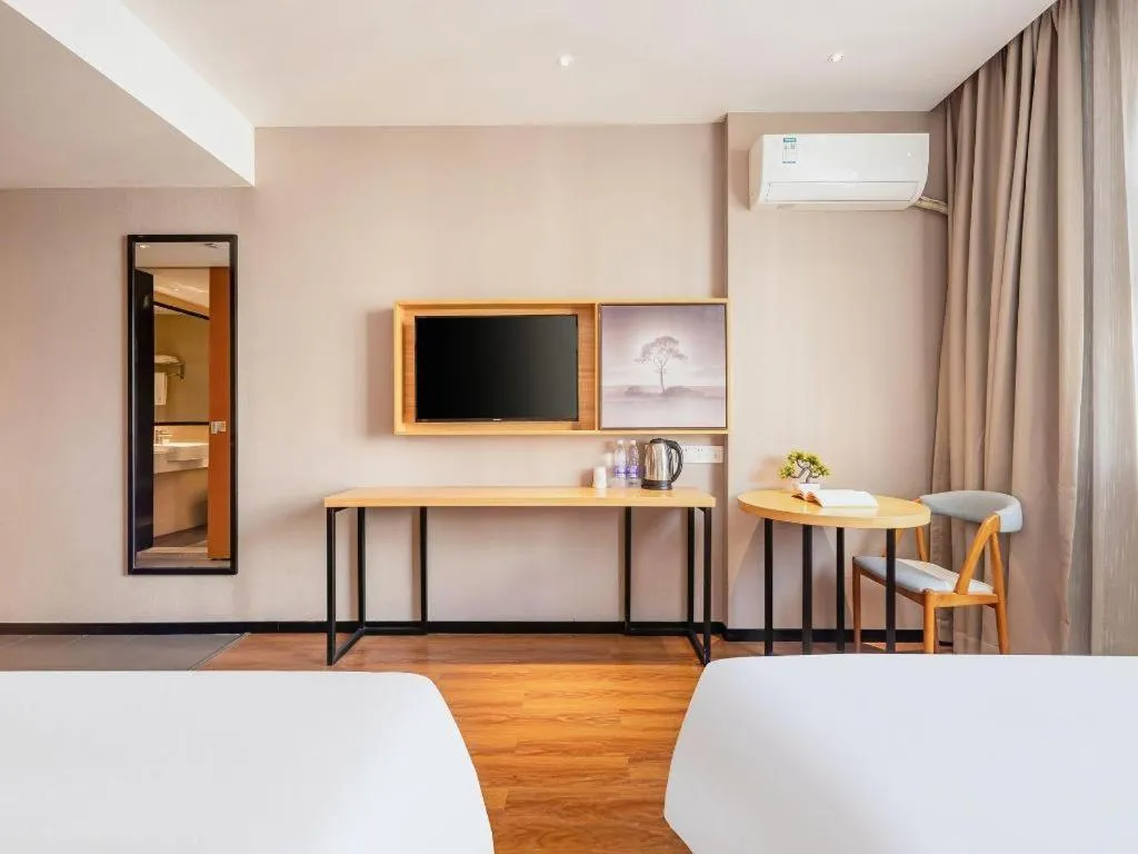 Bed in JTOUR Inn Guigang Life Port High-speed Railway Station