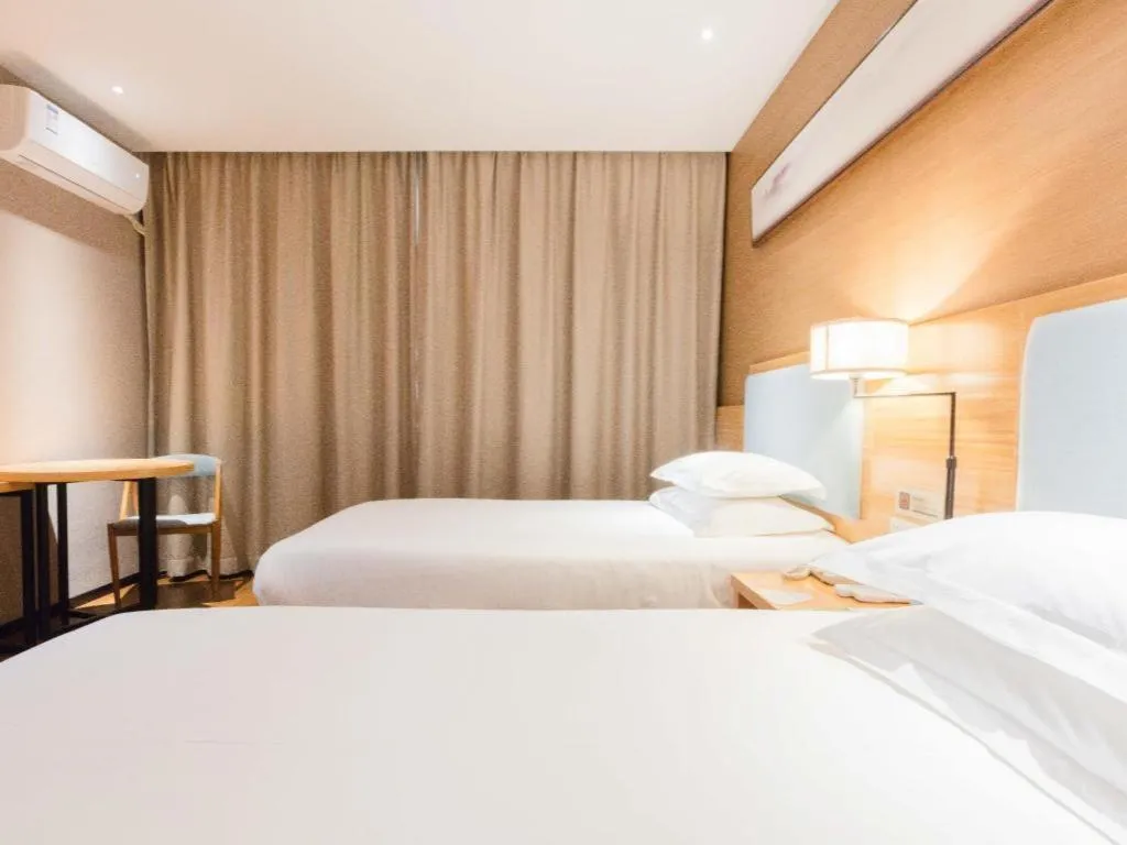 Bed in JTOUR Inn Guigang Life Port High-speed Railway Station