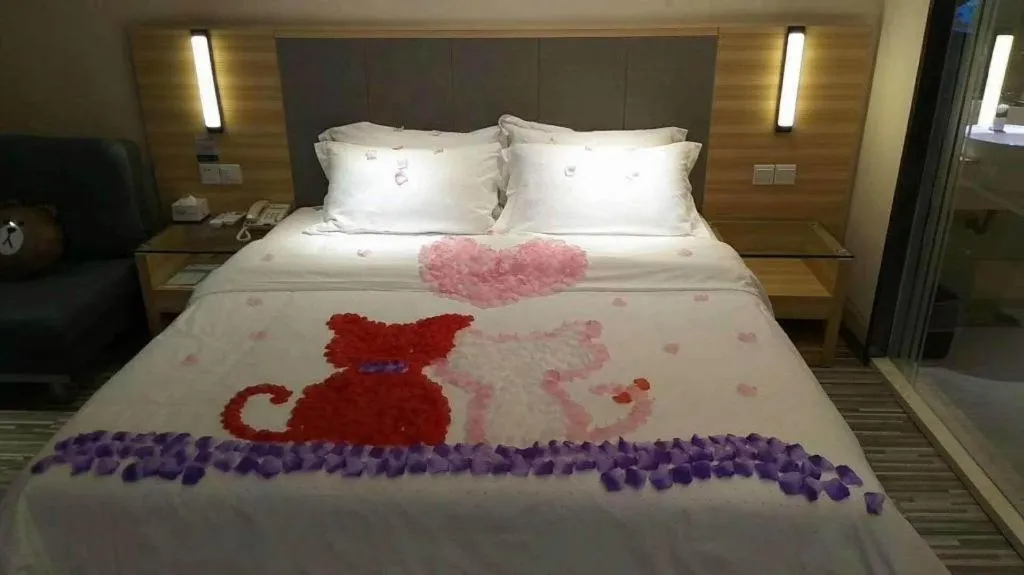 Bed in JTOUR Inn Guigang Life Port High-speed Railway Station