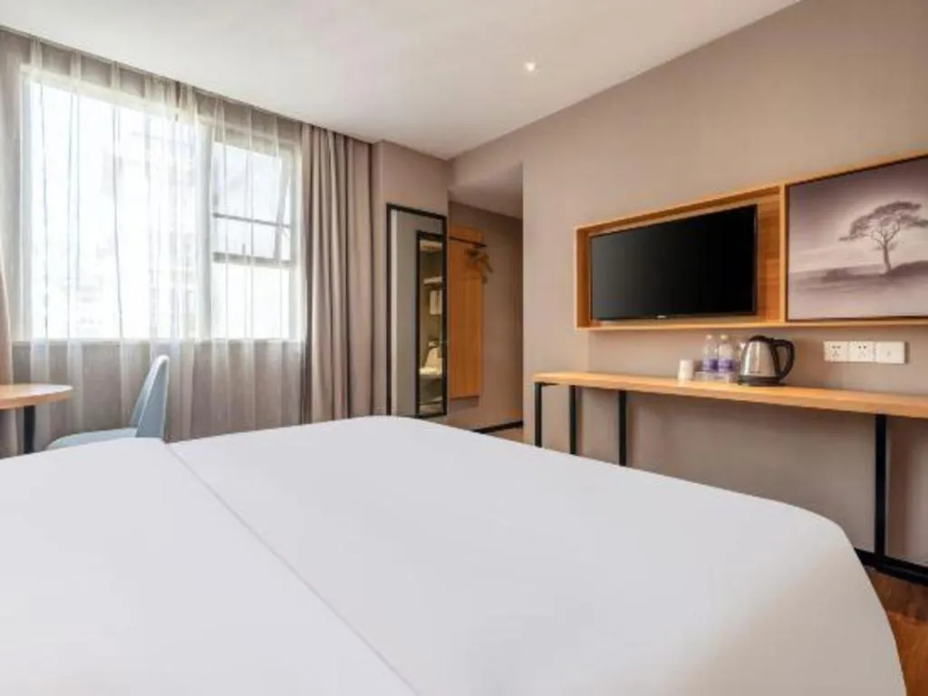 Bed in JTOUR Inn Guigang Life Port High-speed Railway Station