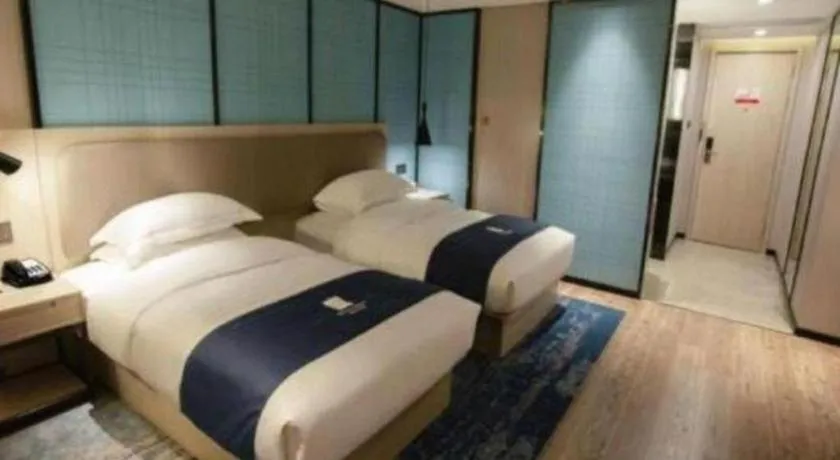 Bed in Echarm Hotel Jianshui Gucheng