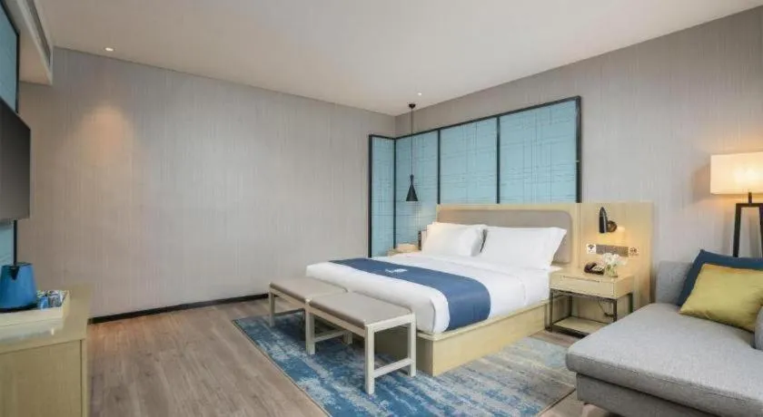 Bed in Echarm Hotel Jianshui Gucheng