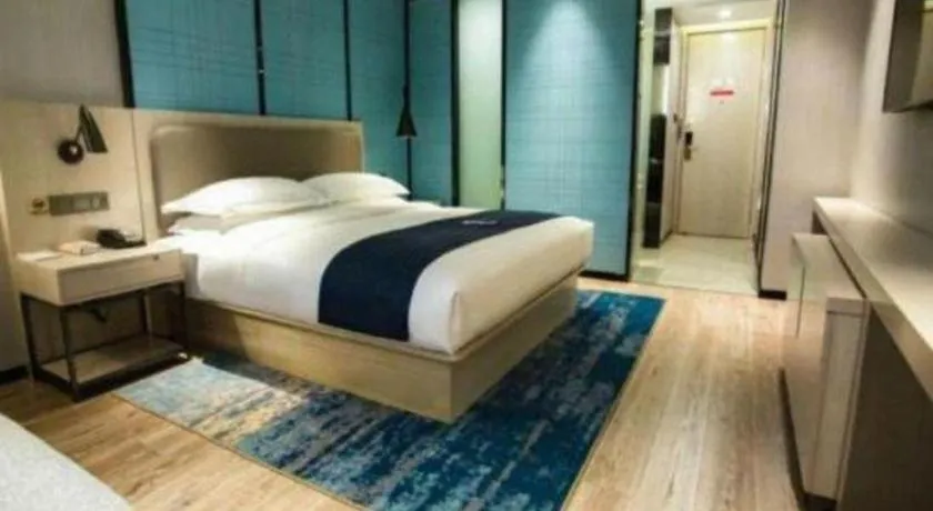 Bed in Echarm Hotel Jianshui Gucheng