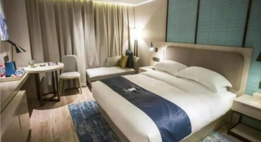 Bed in Echarm Hotel Jianshui Gucheng