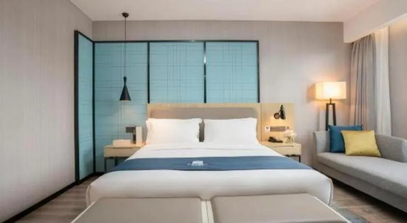 Bed in Echarm Hotel Jianshui Gucheng