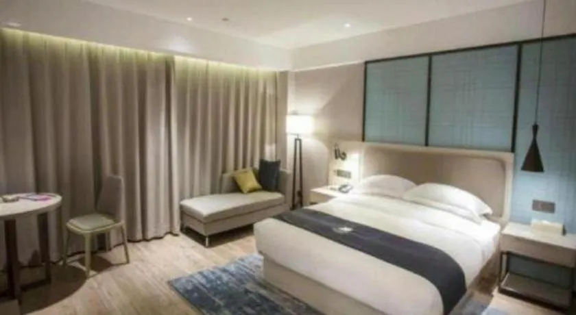 Bed in Echarm Hotel Jianshui Gucheng