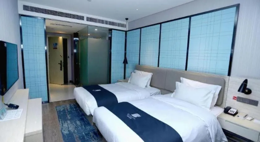 Bed in Echarm Hotel Binzhou Boxing Yinzuo