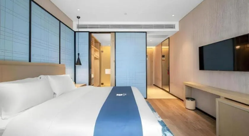 Bed in Echarm Hotel Binzhou Boxing Yinzuo