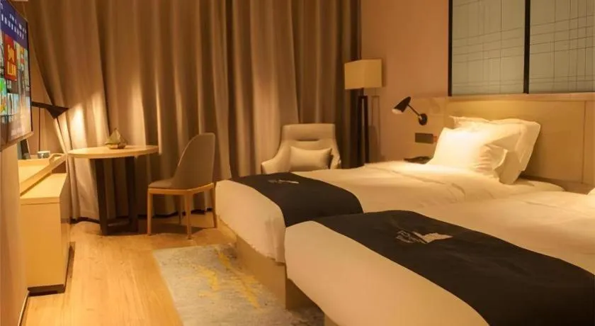 Bed in Echarm Hotel Binzhou Boxing Yinzuo