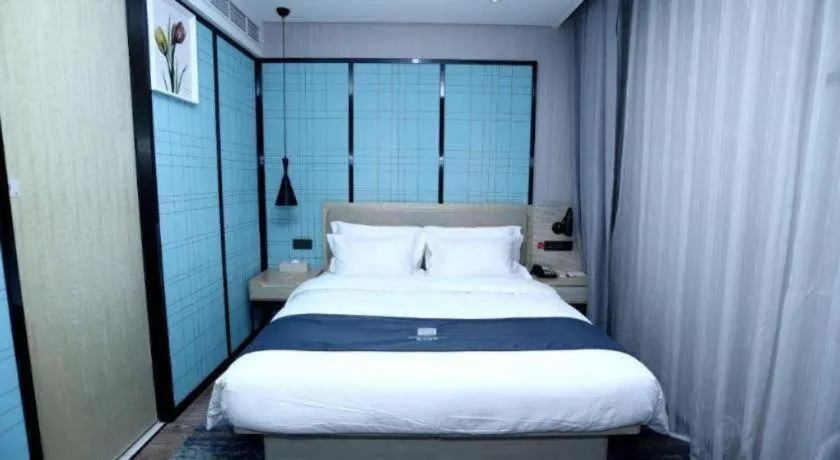 Bed in Echarm Hotel Binzhou Boxing Yinzuo
