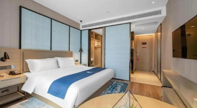 Bed in Echarm Hotel Binzhou Boxing Yinzuo