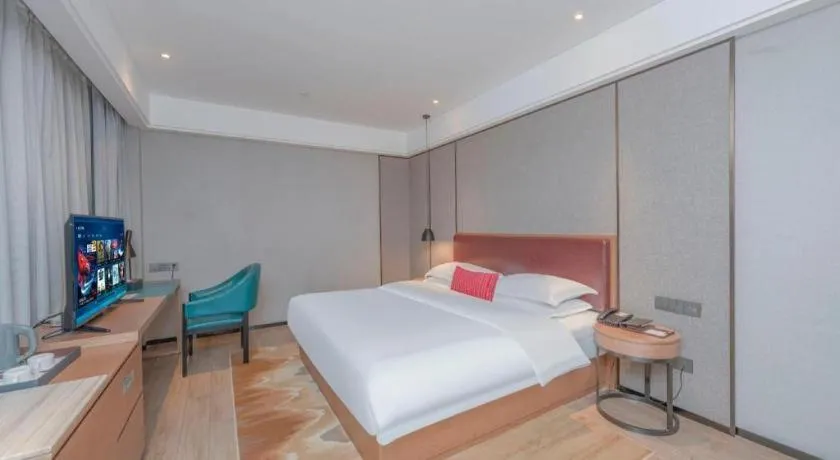 Bed in Borrman Hotel Liuzhou Guizhong Avenue Liugao