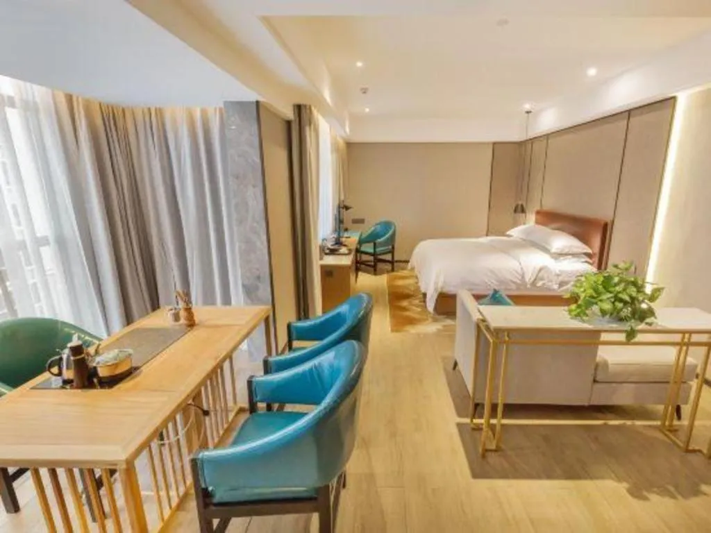 Bed in Borrman Hotel Liuzhou Guizhong Avenue Liugao