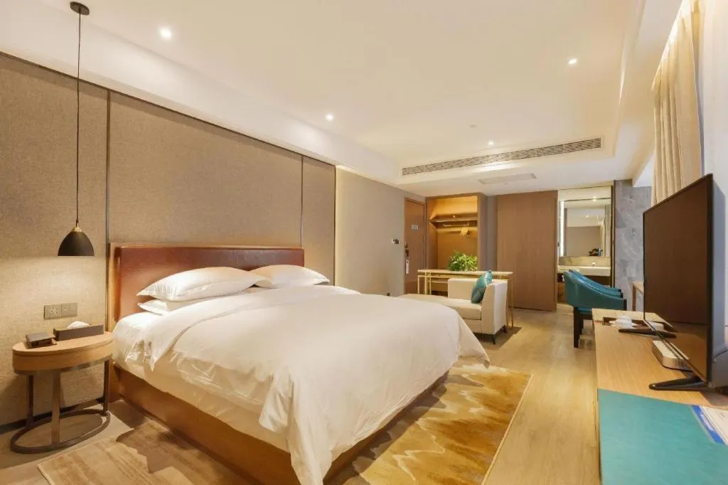 Bed in Borrman Hotel Liuzhou Guizhong Avenue Liugao