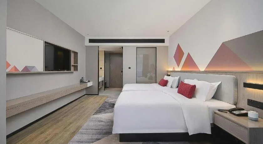 Bed in Borrman Hotel Liuzhou Guizhong Avenue Liugao