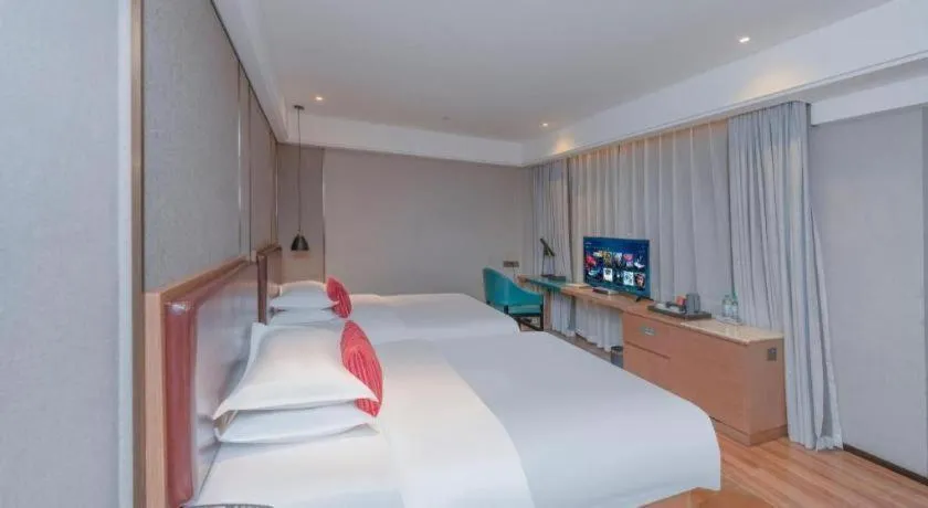 Bed in Borrman Hotel Liuzhou Guizhong Avenue Liugao
