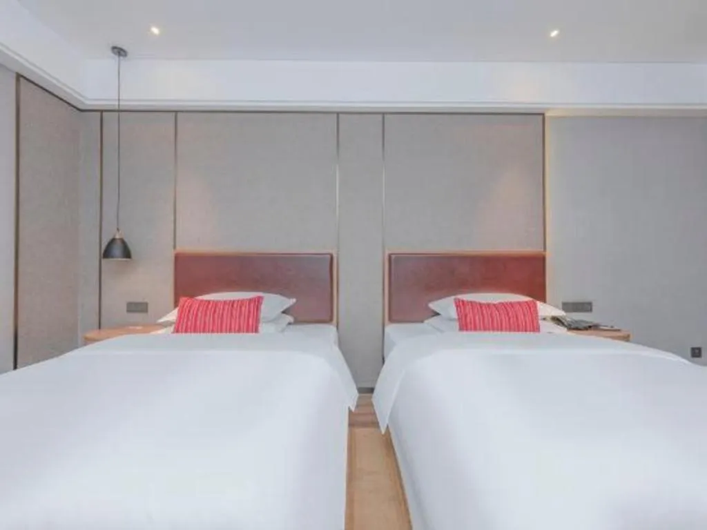Bed in Borrman Hotel Liuzhou Guizhong Avenue Liugao