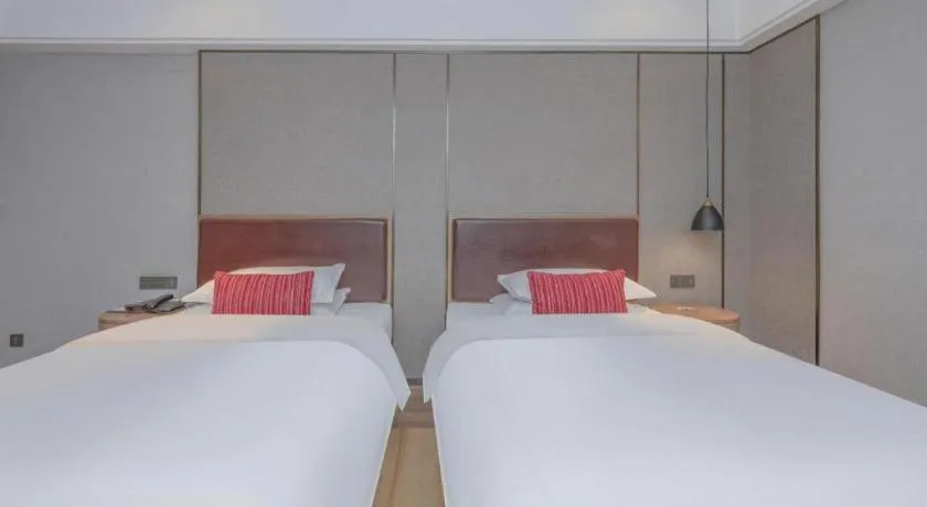 Bed in Borrman Hotel Liuzhou Guizhong Avenue Liugao