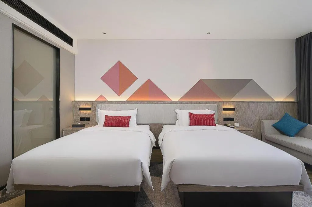 Bed in Borrman Hotel Liuzhou Guizhong Avenue Liugao