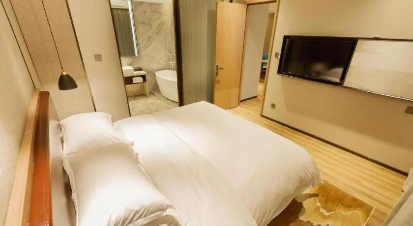 Bed in Borrman Hotel Liuzhou Guizhong Avenue Liugao