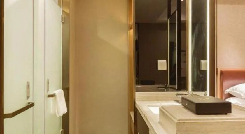 Bed in Borrman Hotel Liuzhou Guizhong Avenue Liugao