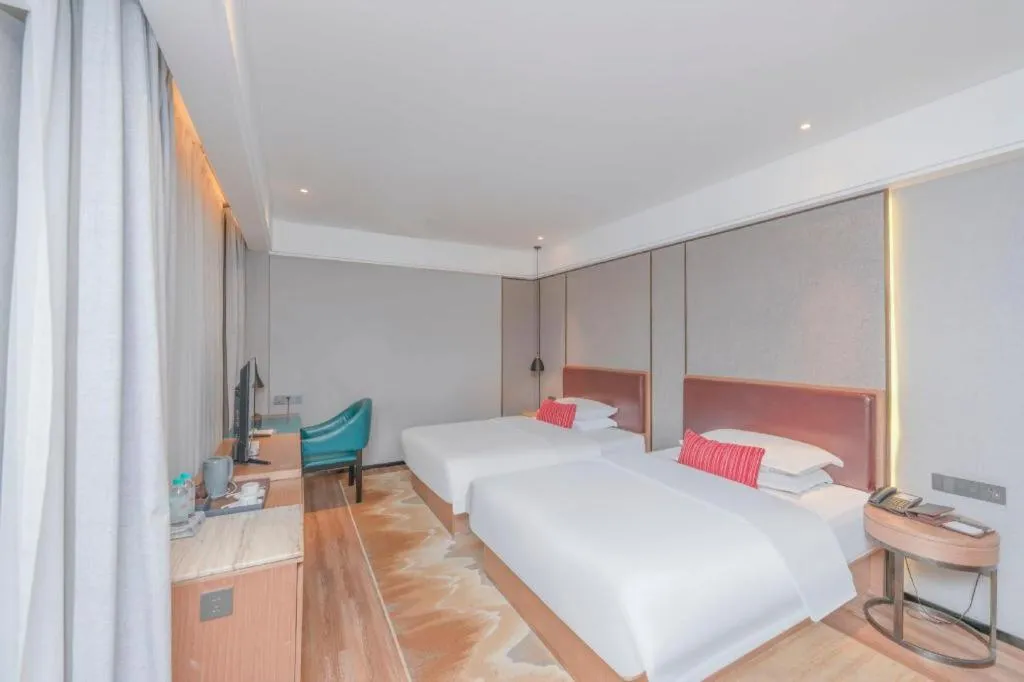 Bed in Borrman Hotel Liuzhou Guizhong Avenue Liugao