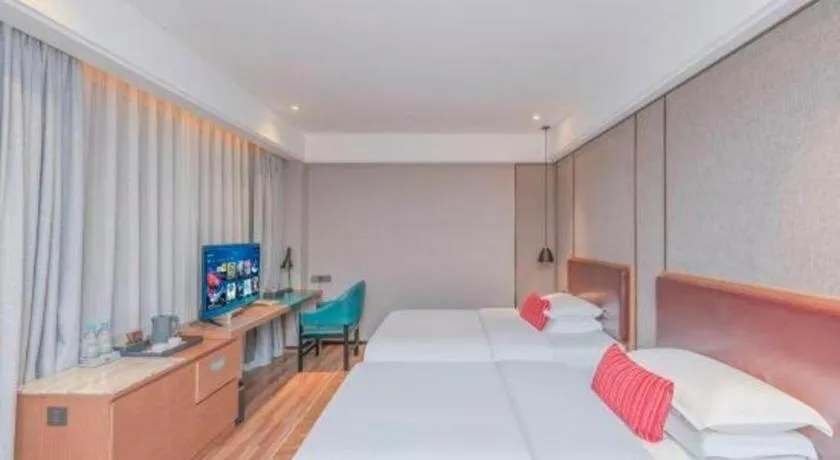 Bed in Borrman Hotel Liuzhou Guizhong Avenue Liugao