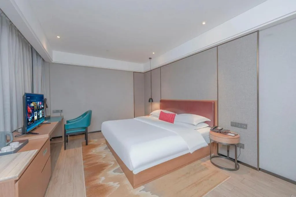Bed in Borrman Hotel Liuzhou Guizhong Avenue Liugao