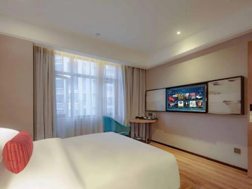 Bed in Borrman Hotel Liuzhou Guizhong Avenue Liugao