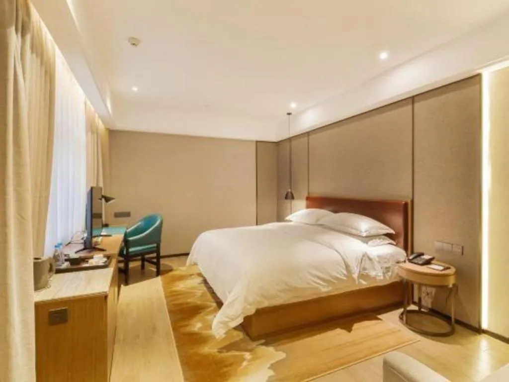Bed in Borrman Hotel Liuzhou Guizhong Avenue Liugao