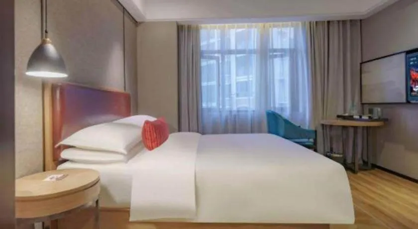 Bed in Borrman Hotel Liuzhou Guizhong Avenue Liugao