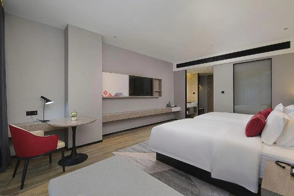 Bed in Borrman Hotel Liuzhou Guizhong Avenue Liugao