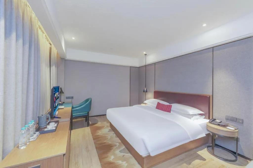 Bed in Borrman Hotel Liuzhou Guizhong Avenue Liugao