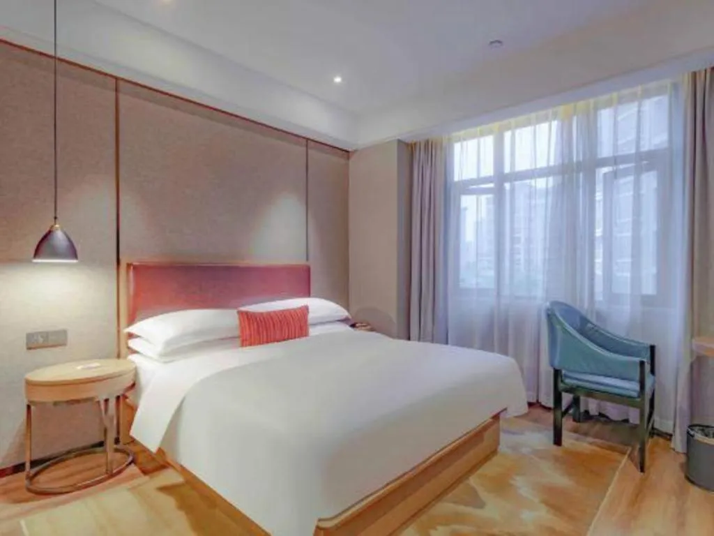 Bed in Borrman Hotel Liuzhou Guizhong Avenue Liugao