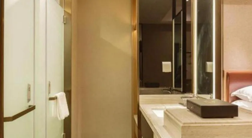 Bed in Borrman Hotel Liuzhou Guizhong Avenue Liugao