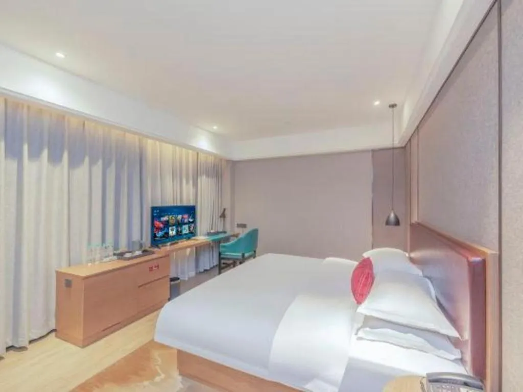 Bed in Borrman Hotel Liuzhou Guizhong Avenue Liugao