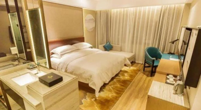 Bed in Borrman Hotel Liuzhou Guizhong Avenue Liugao