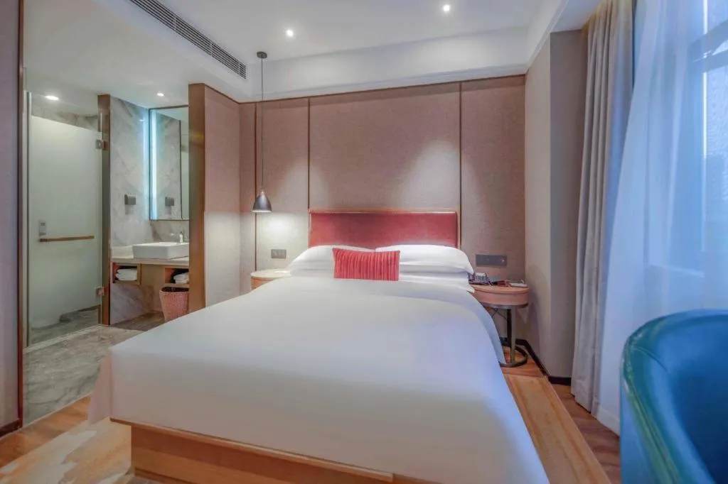 Bed in Borrman Hotel Liuzhou Guizhong Avenue Liugao